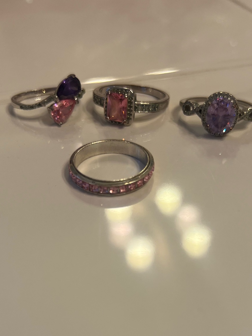 Bundle of Four Silver Tone Pink and Purple Costume Jewelry Rings